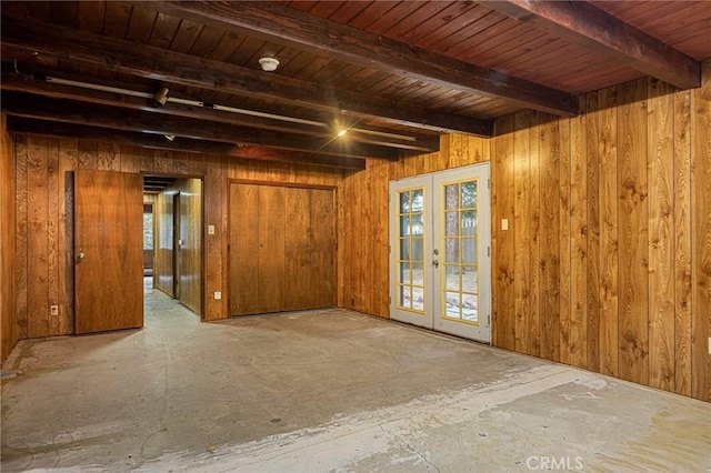 31413 Overhill Dr, Running Springs, CA 92382 - spare room featuring french doors, plenty of natural light, beam ceiling, wooden walls, and a smoke detector
