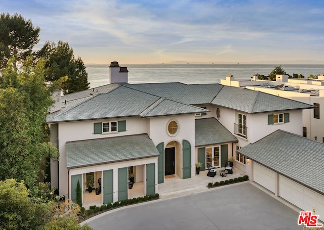 view of front of home featuring a water view