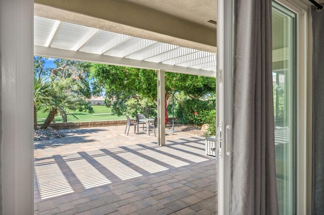 view of patio featuring a pergola