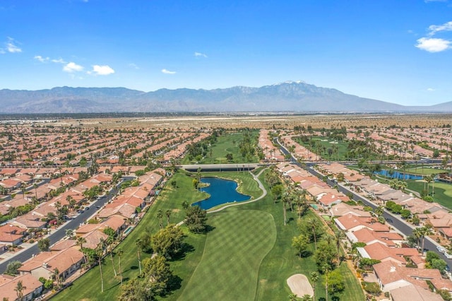 bird's eye view with a water and mountain view