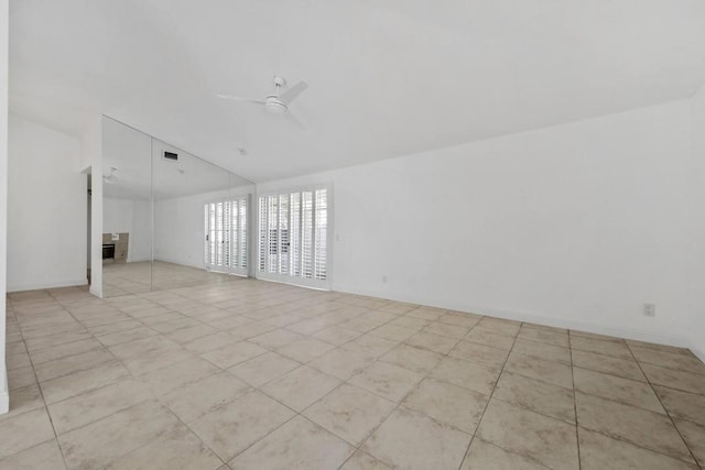 unfurnished room with ceiling fan