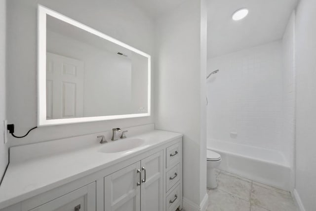 full bathroom featuring toilet, vanity, and tiled shower / bath combo