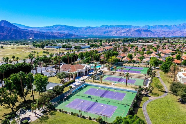 birds eye view of property featuring a mountain view