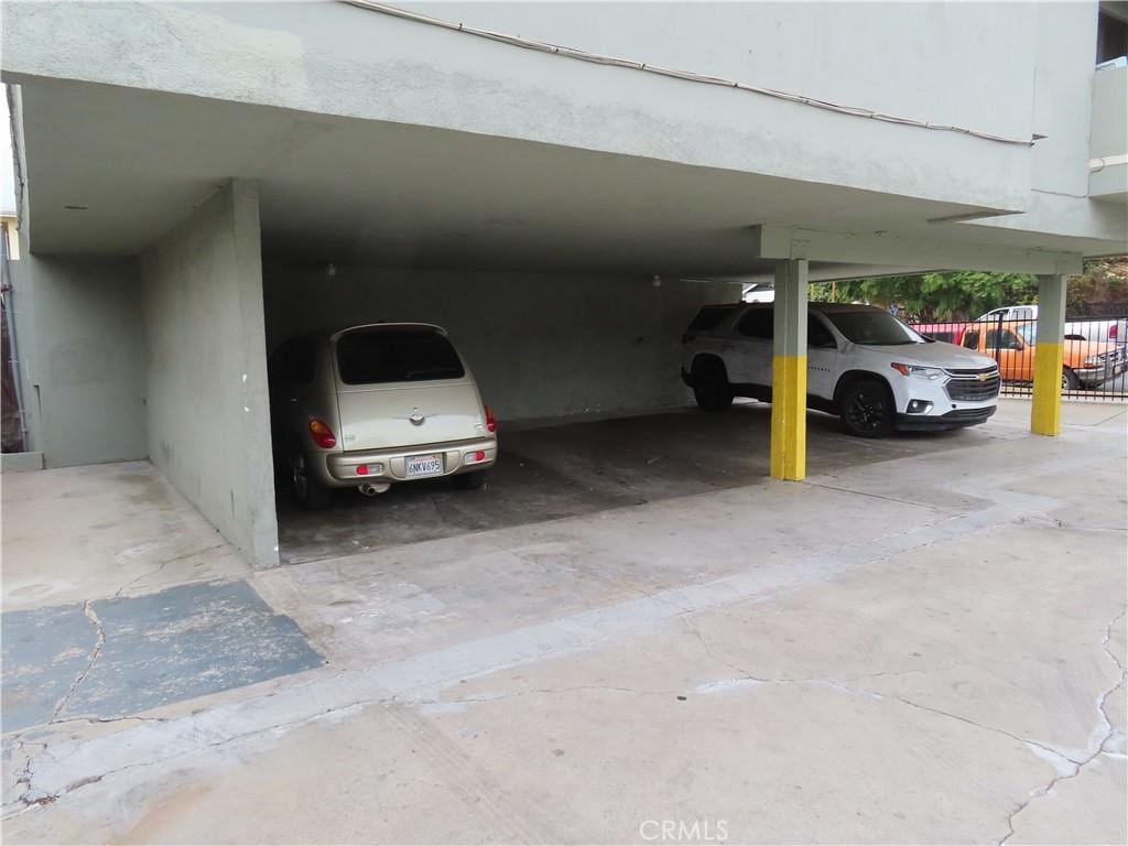 view of parking with a carport