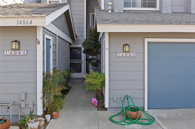 property entrance with a garage