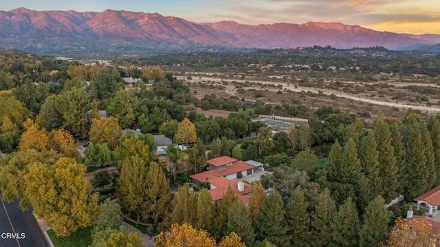 aerial view at dusk with a mountain view