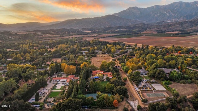 aerial view at dusk with a mountain view