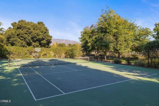 view of sport court featuring a mountain view