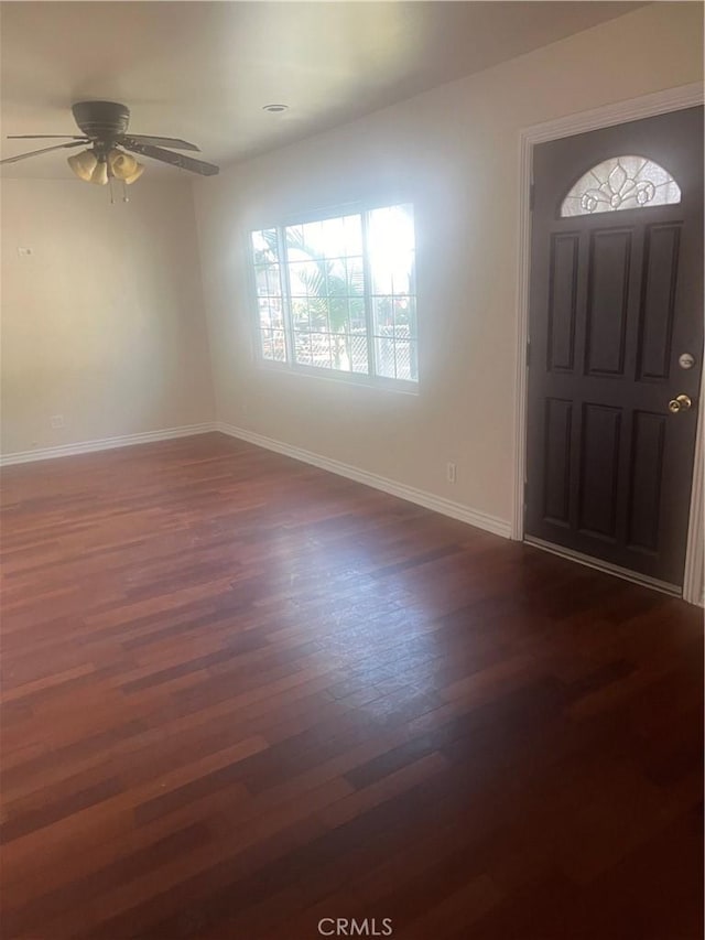 entrance foyer featuring ceiling fan and dark hardwood / wood-style flooring