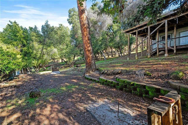 view of yard with a deck