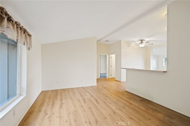 empty room featuring ceiling fan and light hardwood / wood-style flooring