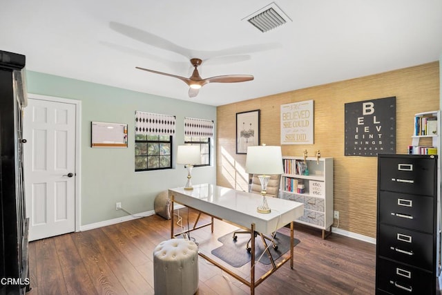 home office featuring ceiling fan and dark hardwood / wood-style floors