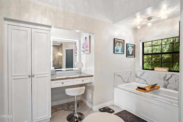 bathroom with a tub to relax in