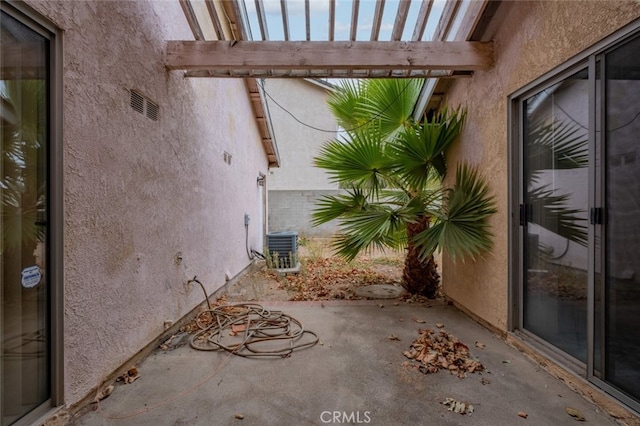 view of patio with cooling unit