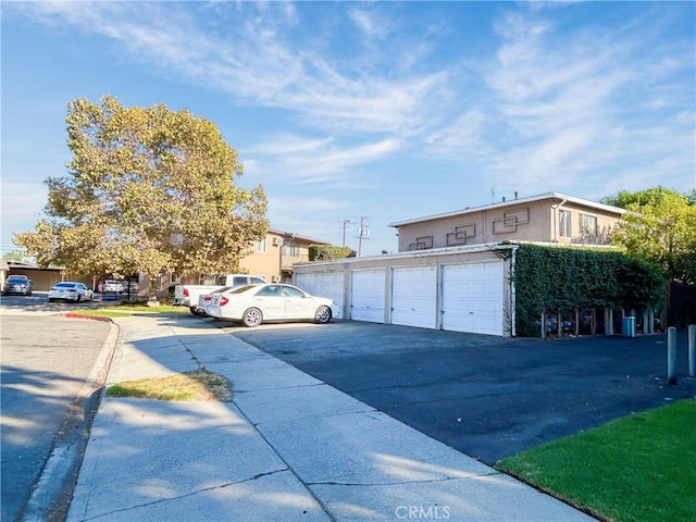 exterior space with a garage