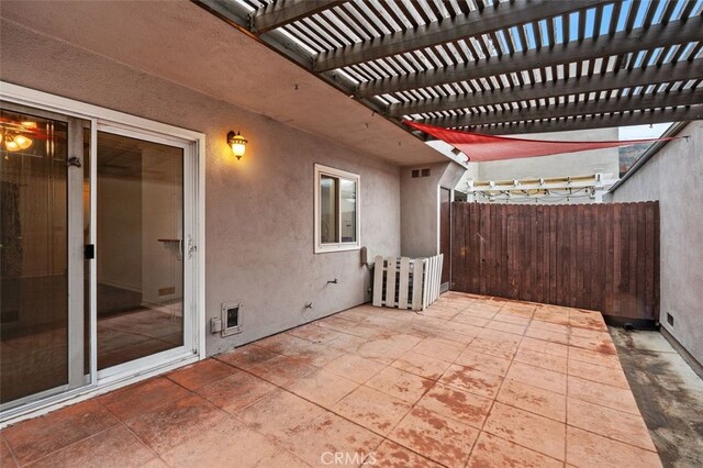 view of patio featuring a pergola