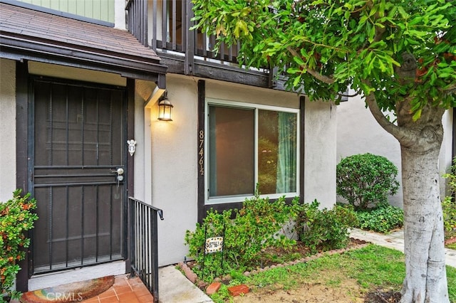 doorway to property with a balcony