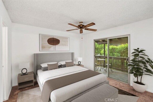 carpeted bedroom featuring ceiling fan, a textured ceiling, and access to outside