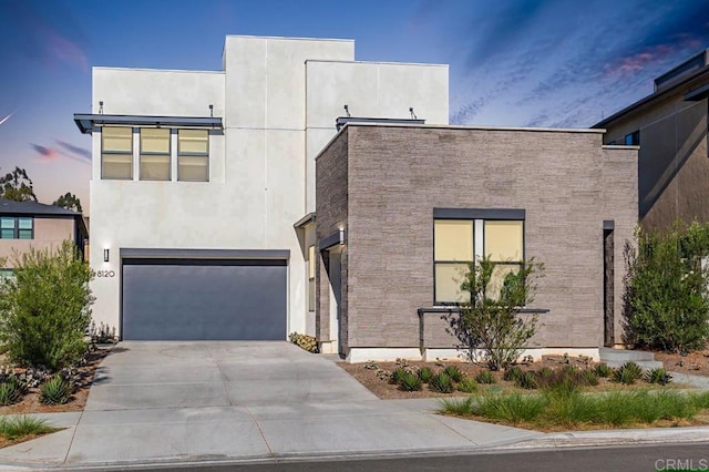 modern home featuring a garage