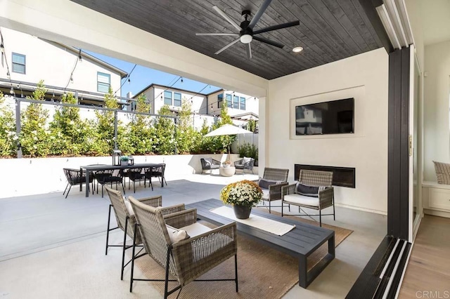 view of patio / terrace featuring an outdoor living space and ceiling fan