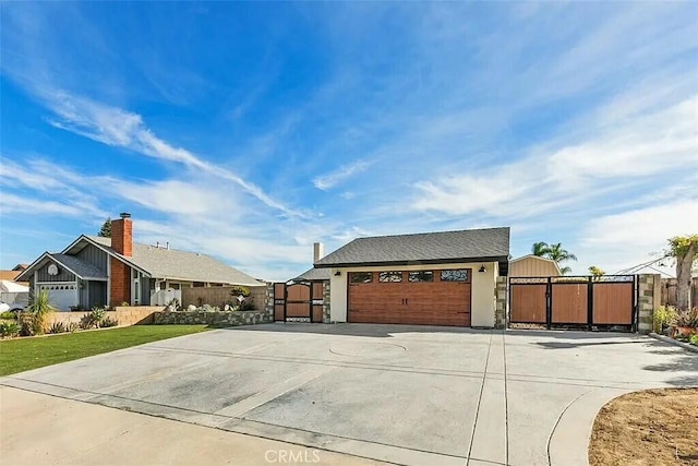 view of side of property with a garage