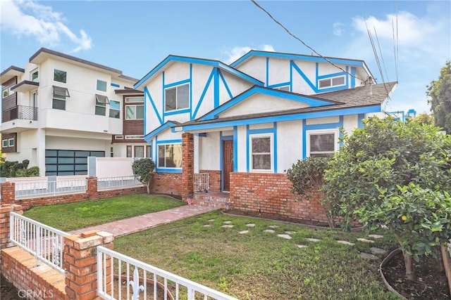 view of front facade featuring a front yard