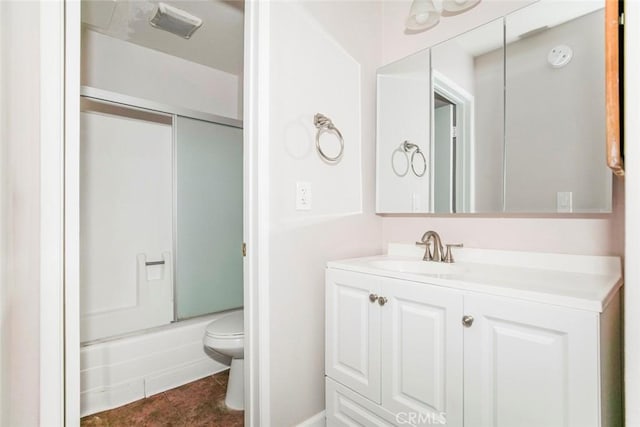 full bathroom with tile patterned flooring, toilet, vanity, and combined bath / shower with glass door