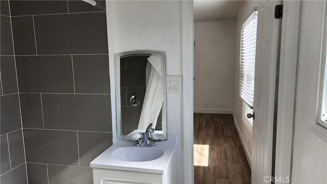 bathroom with wood-type flooring and vanity