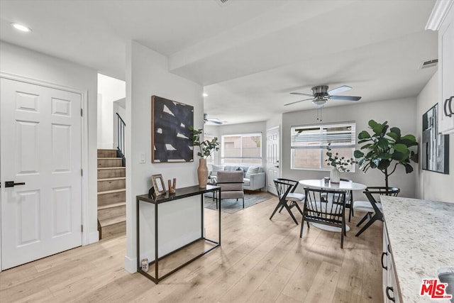 interior space featuring light hardwood / wood-style floors and ceiling fan