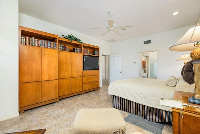 bedroom featuring ensuite bathroom and ceiling fan