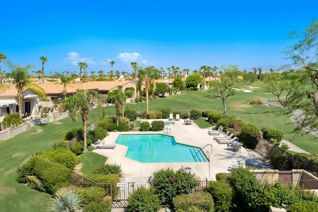 view of swimming pool featuring a patio