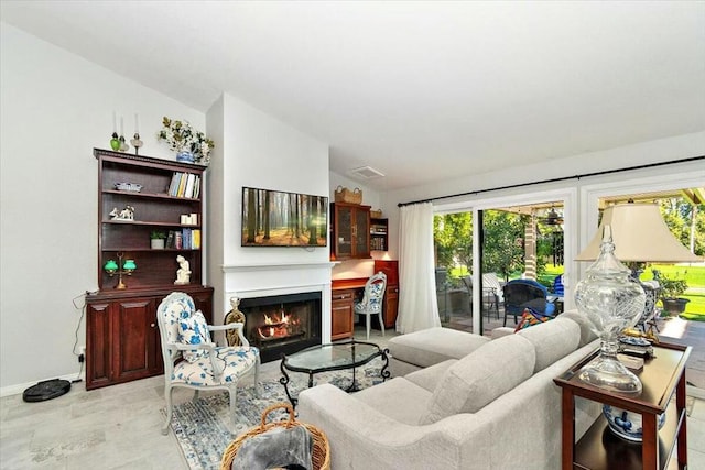 living room featuring vaulted ceiling