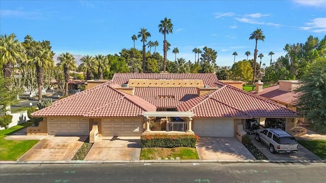 mediterranean / spanish-style home featuring a garage