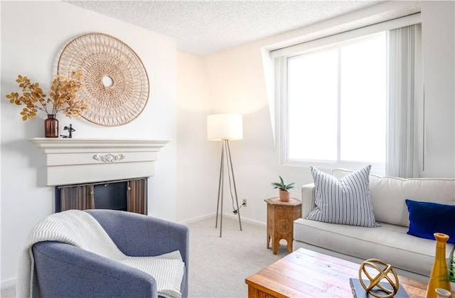 8635 Falmouth Ave Unit 301, Playa Del Rey, CA 90293 - sitting room with carpet floors, baseboards, and a textured ceiling
