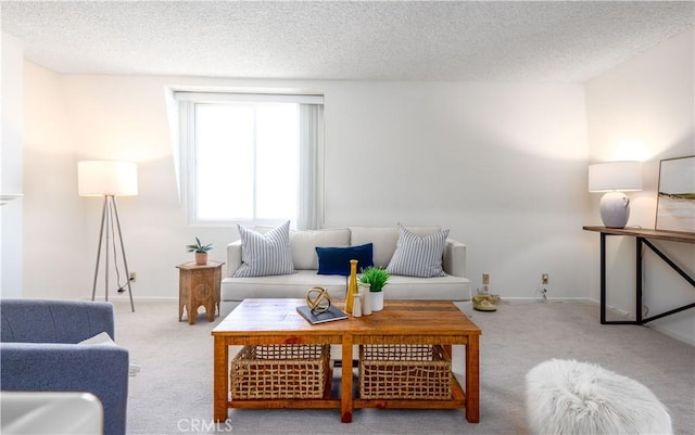 8635 Falmouth Ave Unit 301, Playa Del Rey, CA 90293 - living area featuring carpet floors, a textured ceiling, and baseboards