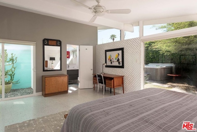 bedroom with beamed ceiling, ceiling fan, access to exterior, and ensuite bathroom