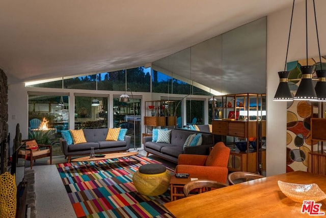 living room with vaulted ceiling