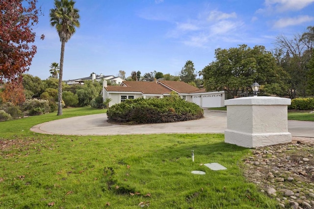 view of yard with a garage