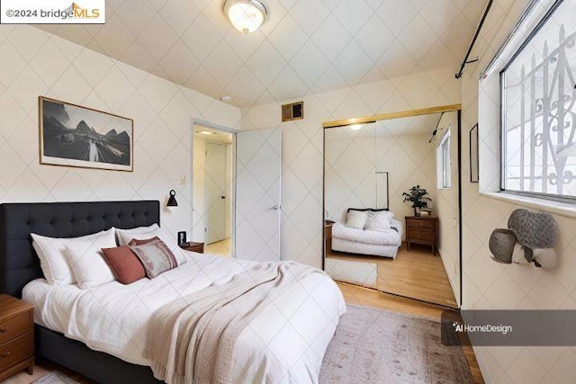 bedroom featuring hardwood / wood-style floors