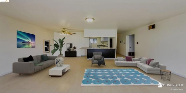 living room featuring ceiling fan