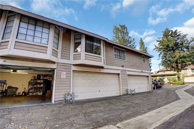 view of property exterior featuring a garage