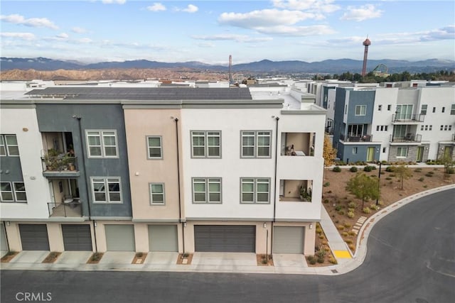 view of building exterior featuring a mountain view