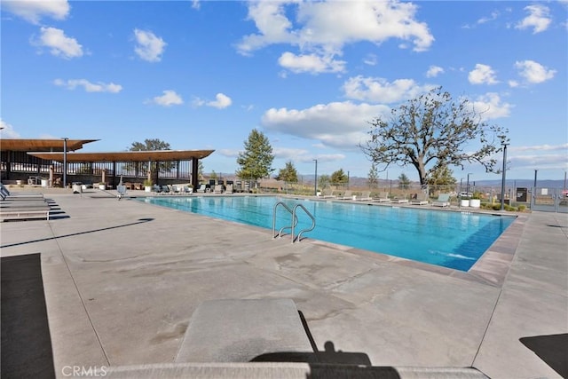 view of pool featuring a patio area