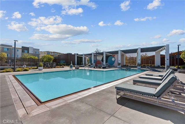 view of pool featuring a patio