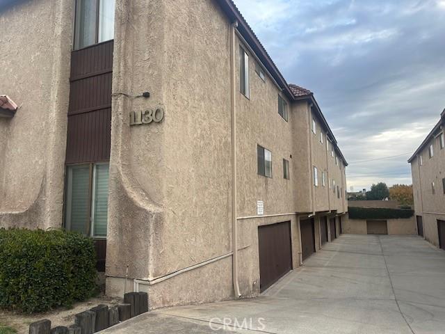 view of building exterior with a garage