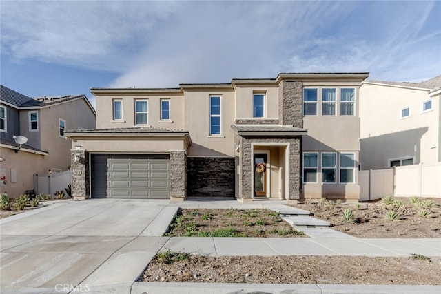 view of front of home with a garage