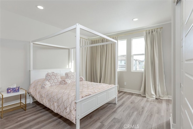 bedroom featuring light hardwood / wood-style flooring