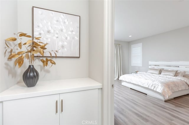 bedroom featuring light wood-type flooring