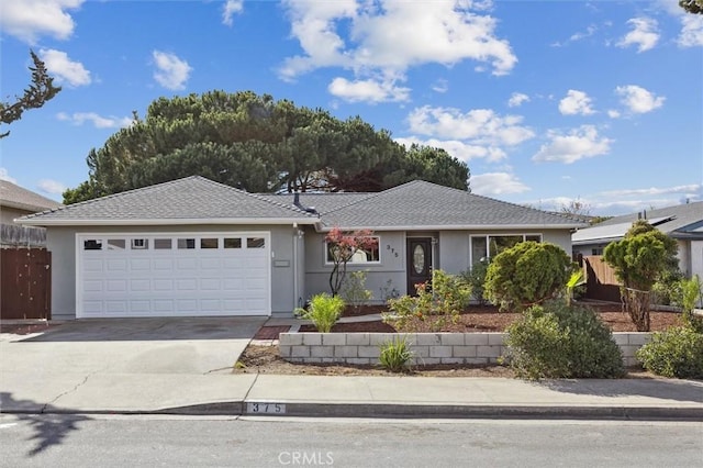 single story home with a garage