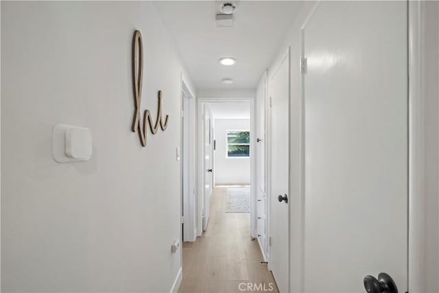 hall featuring light wood-type flooring